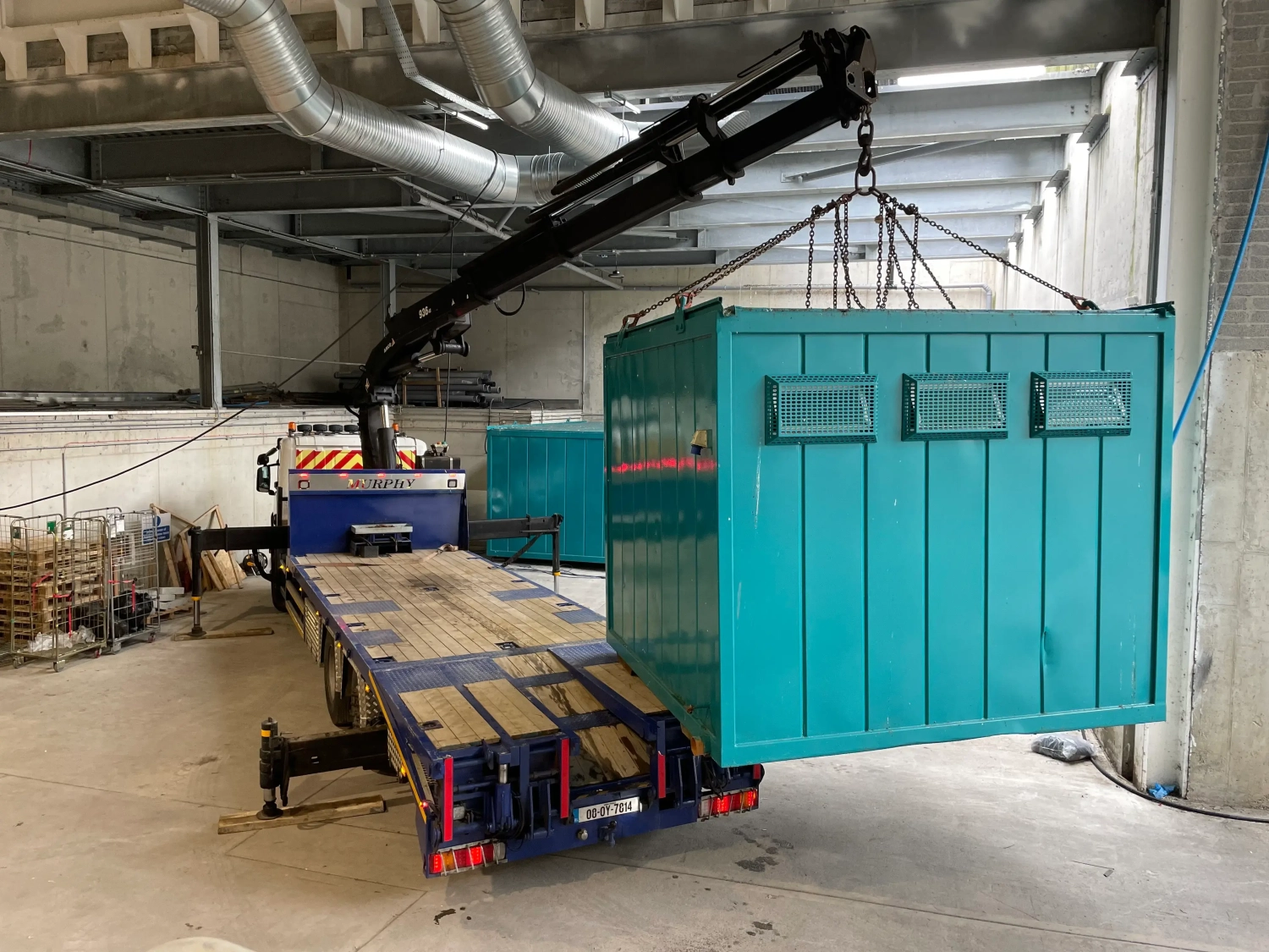Specialized heavy lifting services using certified cranes and equipment to handle large-scale industrial loads safely.